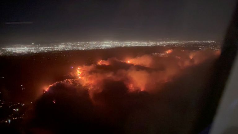 Smoke from the Palisades fire seen from a plane. Pic: Mark Viniello / Reuters