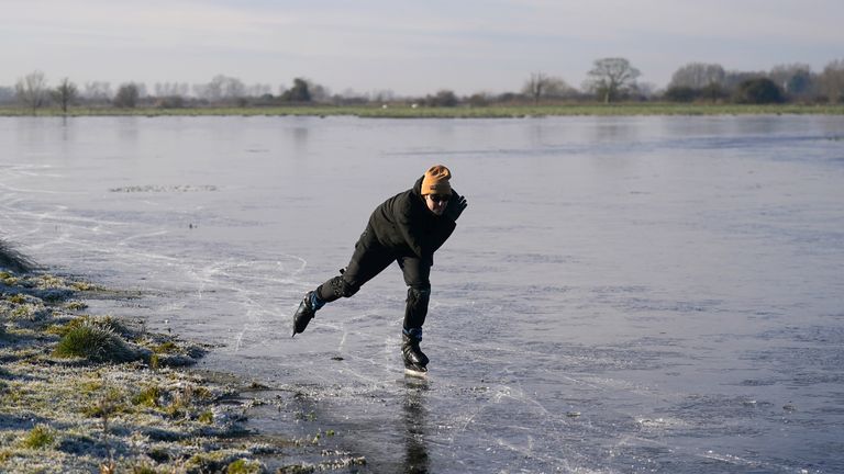 Ugo Sassi from Cambridge skates on a frozen flooded field in Upware, Cambridgeshire. The Cambridgeshire Fens were the birthplace of British speed skating and require four nights of frost, with a temperature of -4 or colder and little or no thawing during the days in between, to make ice strong enough to skate on. Temperatures will continue to fall over the coming days, with the mercury potentially reaching minus 20C in northern parts of the UK on Friday night. Weather warnings for ice are in pla