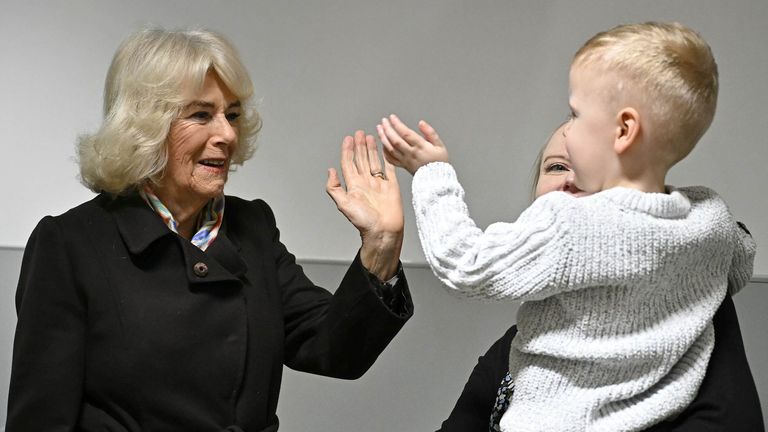 Queen Camilla meets blind patient Jackson James and his mother during a tour to officially open the new Emergency Department at Great Western Hospital
Pic: PA