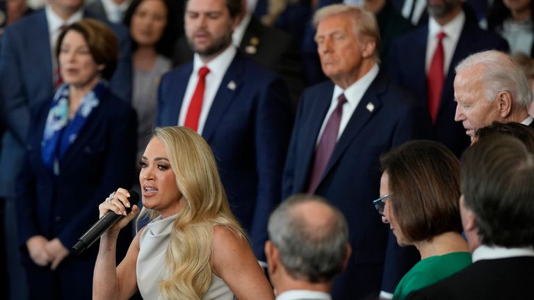 Singer Carrie Underwood sings America The Beautiful to mark the inauguration. Pic: AP