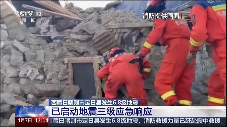 Rescuers look for survivors following an earthquake in Tibet, China. Pic: AP