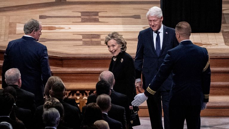 Former President Bill Clinton and First Lady Hillary Clinton arrive at the National Cathedral in Washington, D.C. for a procession before former President Jimmy Carter’s funeral on Thursday, January 9, 2025. Haiyun Jiang/Pool via REUTERS