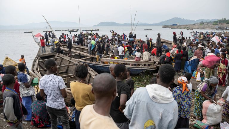 Congo rebels seize eastern town on critical supply route - Internally displaced people from Minova arrive by boat following recent fighting in Kalehe territory between the M23 rebels and the Armed Forces of the Democratic Republic of the Congo (FARDC), in Goma, North Kivu province of the Democratic Republic of Congo January 22, 2025. REUTERS/Arlette Bashizi