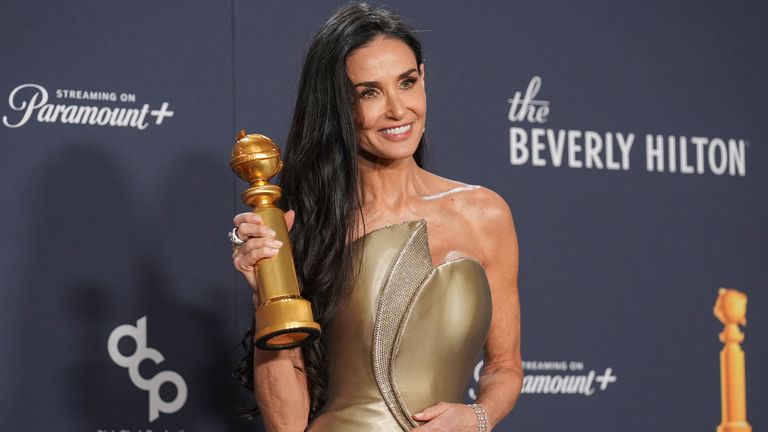 Demi Moore picked up the Golden Globe for best performance by a female actor in a motion picture - musical or comedy - for The Substance. Pic: AP