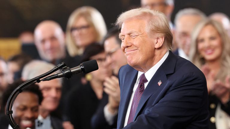 Donald Trump reacts after being sworn in on the day of his Presidential Inauguration