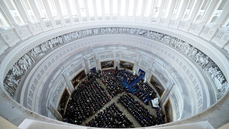 People attend the Inauguration of U.S. President-elect Donald Trump in the Rotunda.
Pic:  Reuters