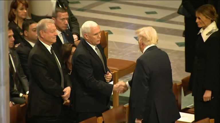 Donald Trump shakes Mike Pence's hand
