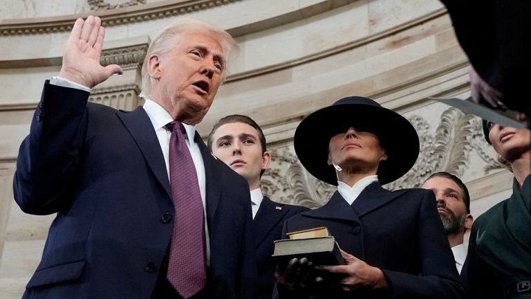 Donald Trump being sworn in. Pic: Reuters