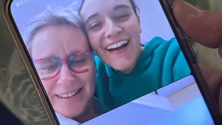 Emily Damari with her mother, video calling her brother