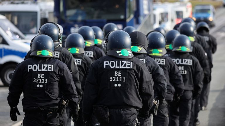 Police officers during the protest that blocked a road near the venue for the AfD party congress.
Pic: Reuters/Thilo Schmuelgen