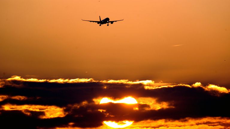 File photo dated 02/03/10 of a plane arrives at Heathrow airport as the sun rises over London. The world's richest 1% have already burned their way through their share of the annual global carbon budget in the first 10 days of 2025, according to Oxfam. The charity used the analysis to renew its calls for a tax on private jet flights in Scotland. Issue date: Friday January 10, 2025.

