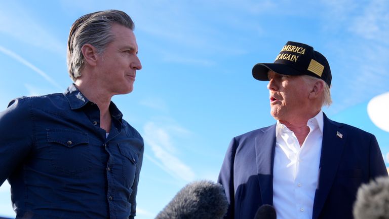 California's governor Gavin Newsom welcomes Donald Trump to Los Angeles. Pic: AP