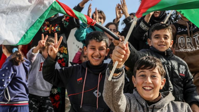 19 January 2025, Palestinian Territories, Rafah: Palestinians celebrate at the entrance of Rafah as a ceasefire between Israel and Hamas comes into effect, in the Gaza Strip. Photo by: Abed Rahim Khatib/picture-alliance/dpa/AP Images


