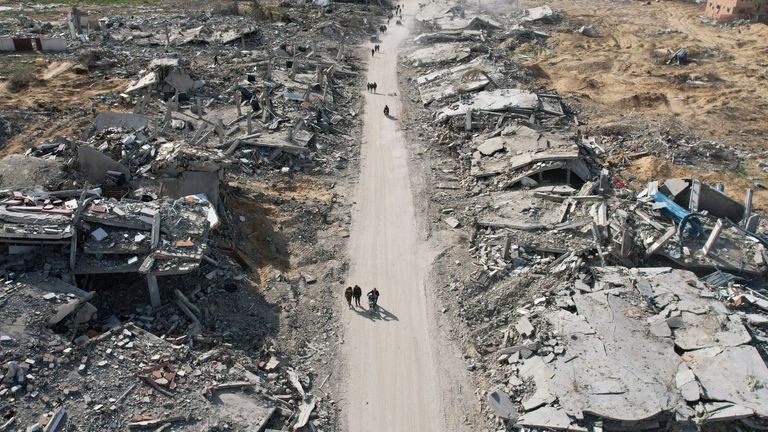 A drone view shows Palestinians returning to devastated Rafah, amid a ceasefire between Israel and Hamas, in the southern Gaza Strip, January 19, 2025. REUTERS/Mohammed Fayed

