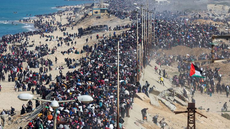 Displaced Palestinians make their way back to their homes earlier this week. Pic: Reuters