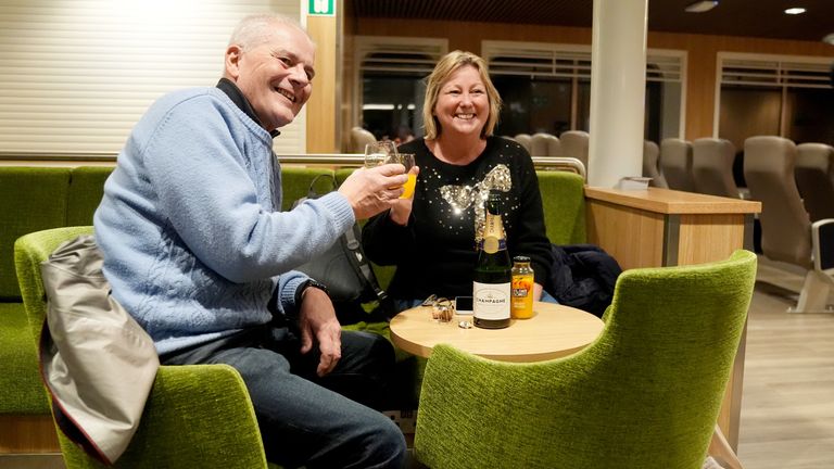 Passengers enjoying a glass of bubbly. Pic PA