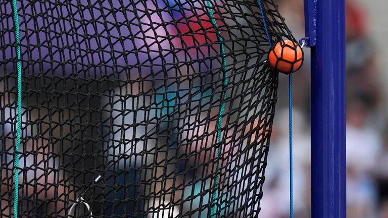 A hammer caught by the safety net during the men's hammer throw qualification at the 2024 Summer Olympics. Pic: AP