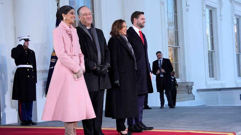 Vice president Kamala Harris, center right, and her husband Doug Emhoff pose with vice president-elect JD Vance, right, and his wife Usha Vance. Pic: AP