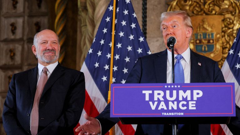 U.S. President-elect Donald Trump delivers remarks adjacent  to CEO of Cantor Fitzgerald and Trump's nominee for Commerce Secretary Howard Lutnick, astatine  Mar-a-Lago successful  Palm Beach, Florida, U.S., December 16, 2024. REUTERS/Brian Snyder