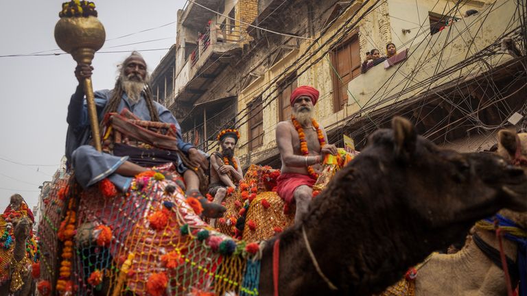 Holy men take part in a religious procession. Pic: Reuters