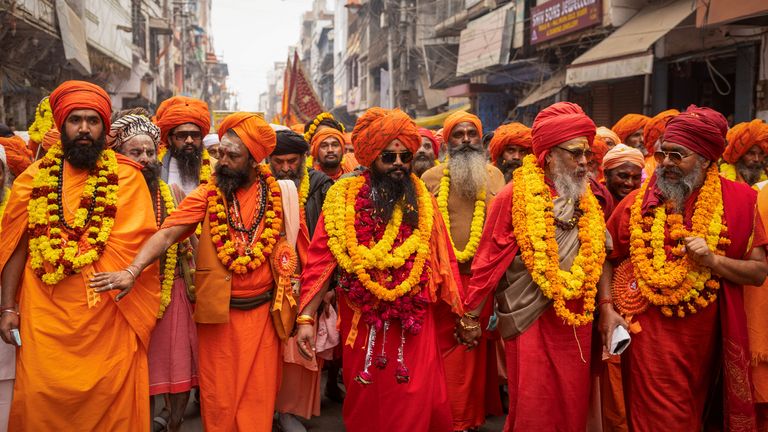 Holy men take part in a religious procession. Pic: Reuters