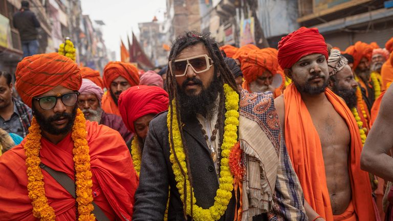 Holy men take part in a religious procession. Pic: Reuters