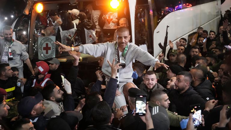 Crowd greets Zakaria Zubeidi.
Pic: AP/Mahmoud Illean