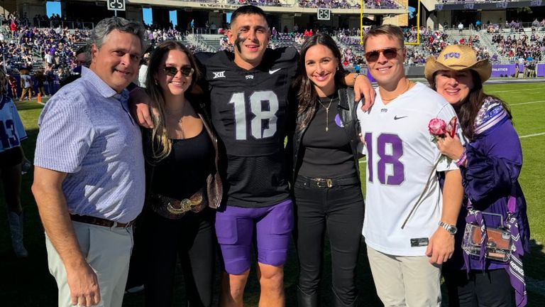 The Bech family with Jack Bech in American football gear in the centre with his brother Tiger in the white top on the right, standing in between his sister and mother. On the left of the picture are Jack and Tiger's father and sister. Pic: Jack Bech