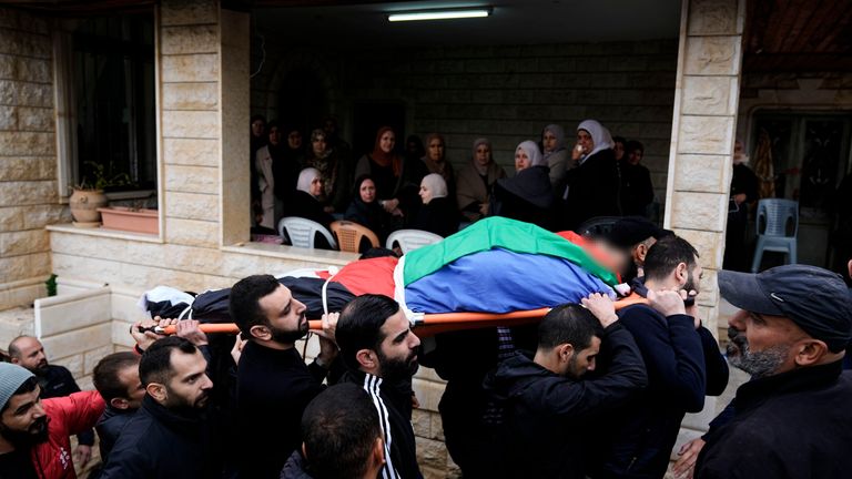 Mourners carry the body of Ahmed al Shayeb after he was killed during an Israeli military operation in Jenin, on Wednesday. Pic: AP