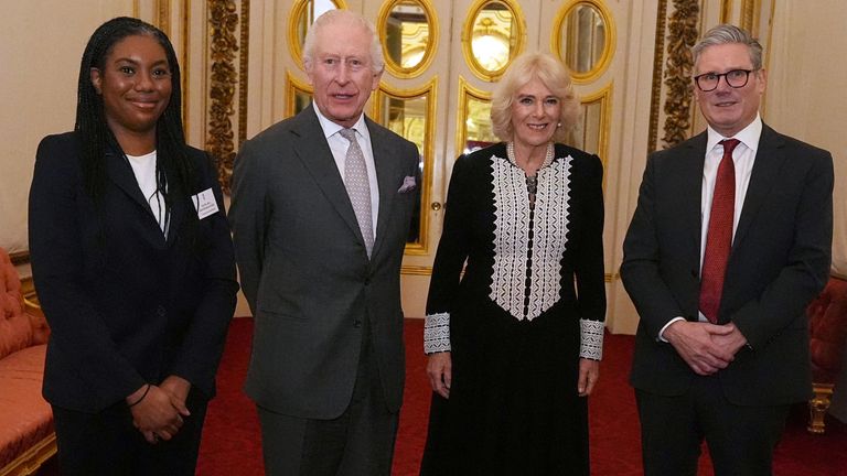 Britain's King Charles III and Queen Camilla with Conservative Party leader Kemi Badenoch and Prime Minister Sir Keir Starmer during a reception for members of Parliament newly elected in the 2024 election, and members of the House of Lords, at Buckingham Palace in London. Picture date: Wednesday January 29, 2025. Aaron Chown/Pool via REUTERS