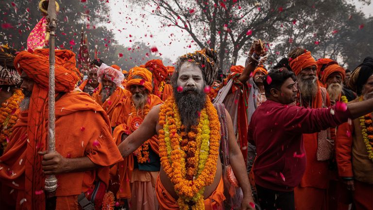 Holy men take part in a religious procession. Pic: Reuters