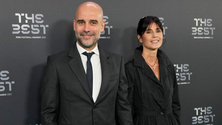 Manchester City's coach Pep Guardiola and his wife Cristina Serra arrive for the FIFA Football Awards 2023 at the Eventim Apollo in Hammersmith, London, Monday, Jan. 15, 2024. (AP Photo/Kirsty Wigglesworth)