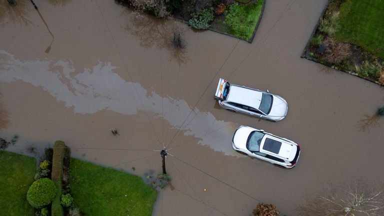 Abandoned cars after flooding in Manchester. Pic: Reuters