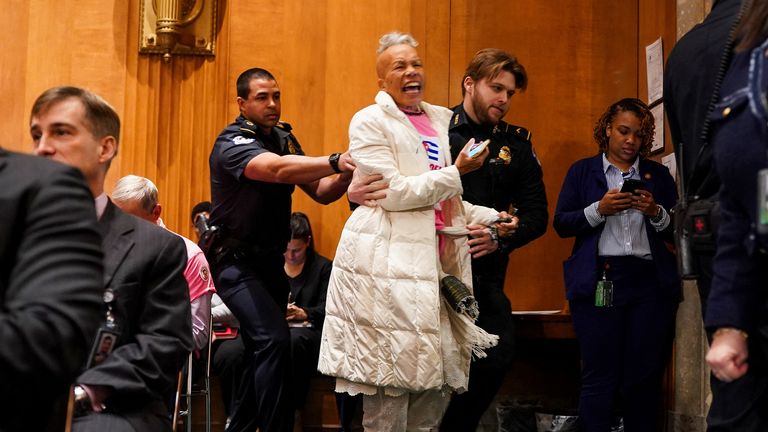 Security personnel remove a protester as U.S. Senator Marco Rubio testifies during a Senate Foreign Relations Committee confirmation hearing.
Pic: Reuters