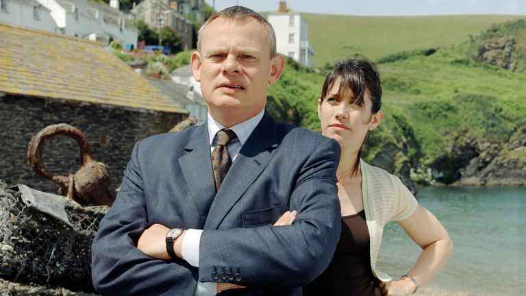 Clunes with With Caroline Catz in Doc Martin. Pic: Rex Features