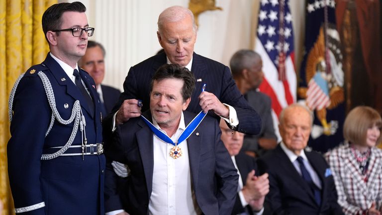 President Joe Biden presents the Presidential Medal of Freedom to Michael J Fox. Pic: AP