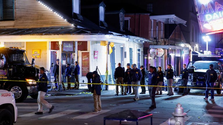 FBI agents at the scene of the attack in New Orleans. Pic: Reuters