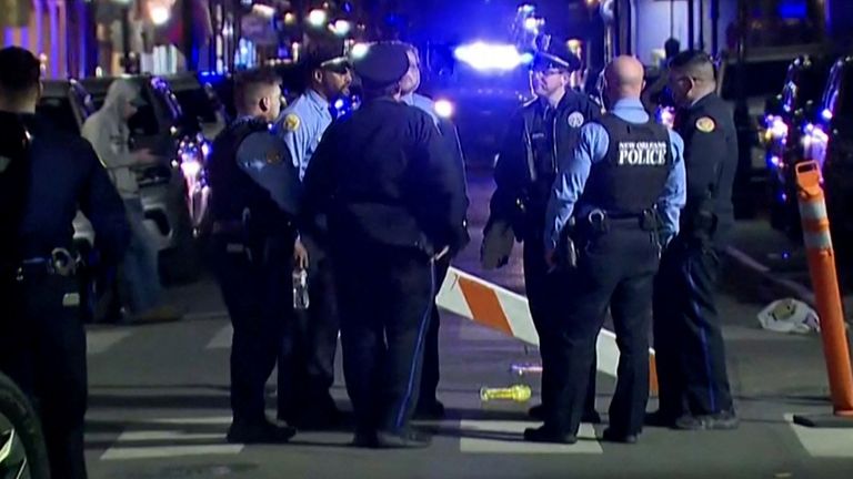 Police officers stand at the scene where a truck drove into a large crowd on Bourbon Street in the French Quarter of New Orleans, Louisiana, U.S. January 1, 2025 in this screengrab taken from a video. ABC Affiliate WGNO/Handout via REUTERS THIS IMAGE HAS BEEN SUPPLIED BY A THIRD PARTY. NO RESALES. NO ARCHIVES. MANDATORY CREDIT

