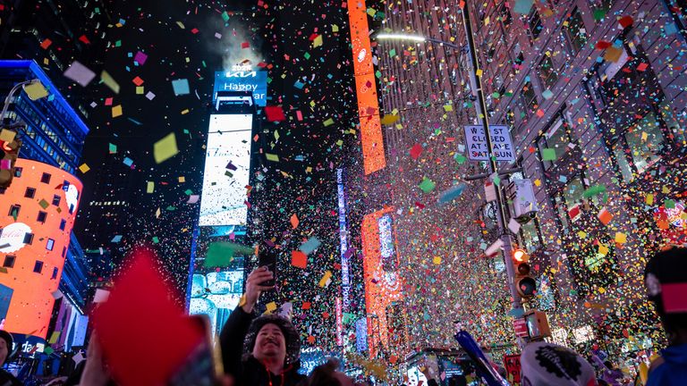 Revelers celebrate after the ball drops in New York's Times Square, Wednesday, Jan. 1, 2025, in New York. (AP Photo/Stefan Jeremiah)