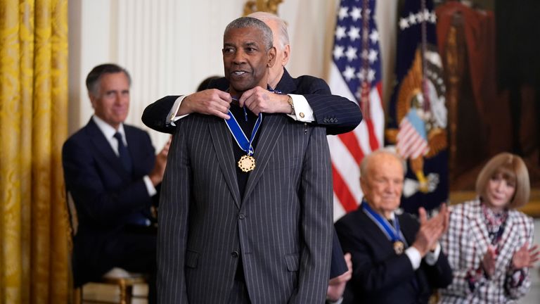 President Joe Biden presents the Presidential Medal of Freedom to Denzel Washington. Pic: AP