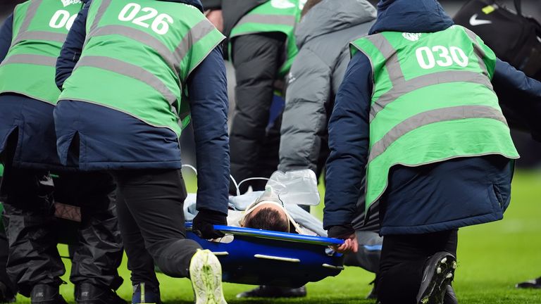 Bentancur stretchered off by medical team after injury. Pic: PA