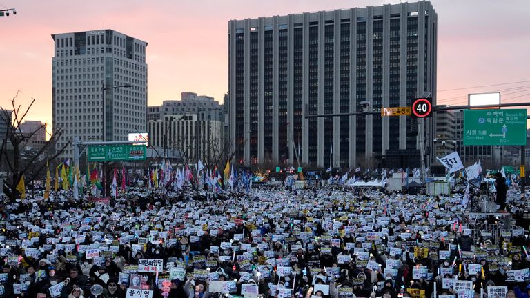 Protesters stage a rally demanding the arrest of impeached South Korean President Yoon Suk Yeol in Seoul, South Korea, Saturday, Jan. 4, 2025. (AP Photo/Ahn Young-joon)