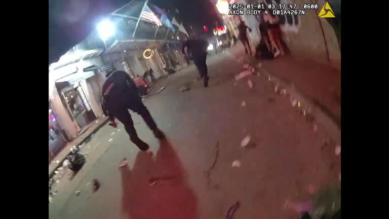 Bodycam video from Officer Luis Robles released by New Orleans Police showing Shamsud-Din Jabbar shooting from behind an airbag as several officers surround his truck
Pic: New Orleans Police
