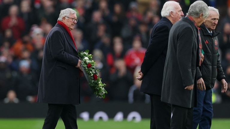 Sir Alex Ferguson with a wreathe to pay tribute to Denis Law at Old Trafford. Pic: Reuters