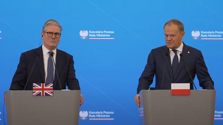 Sir Keir Starmer and Donald Tusk hold a joint press conference in Warsaw. Pic: Reuters