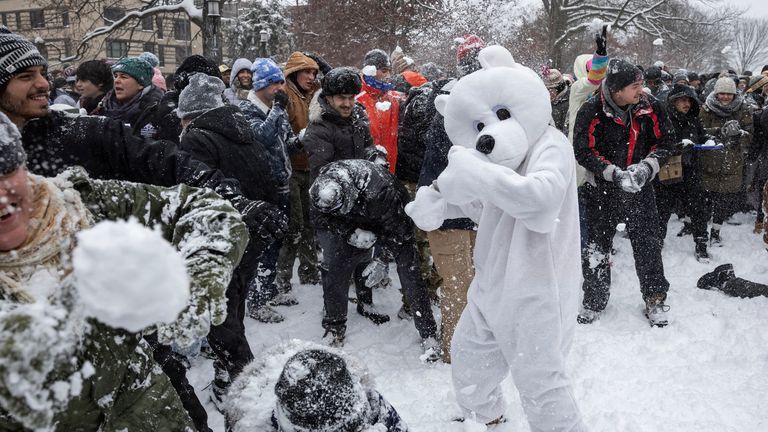 A huge snowball fight broke out at Washington DC's Meridian Hill Park on Monday. Pic: Reuters