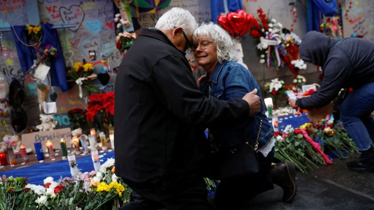 Cathy and Louis Tenedorio, parents of Matthew Tenedorio, one of the victims of a truck attack on New Year's Day, react as they attend a vigil, in New Orleans, Louisiana, U.S. January 4, 2025. REUTERS/Octavio Jones