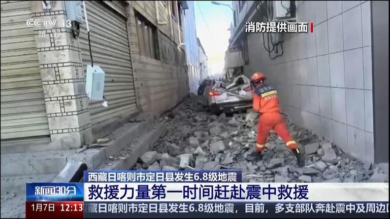 Rescuers look for survivors following an earthquake in Tibet, China. Pic: AP