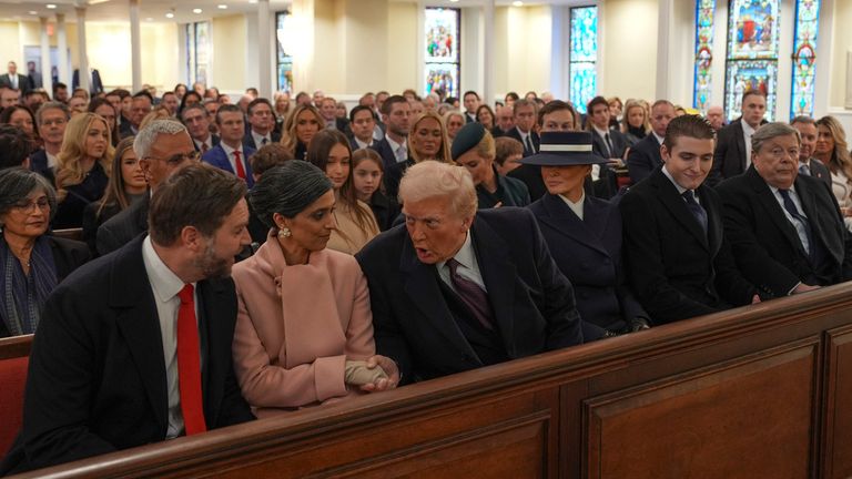 President-elect Donald Trump talks with Vice President-elect JD Vance and Usha Vance before the service. Pic: AP