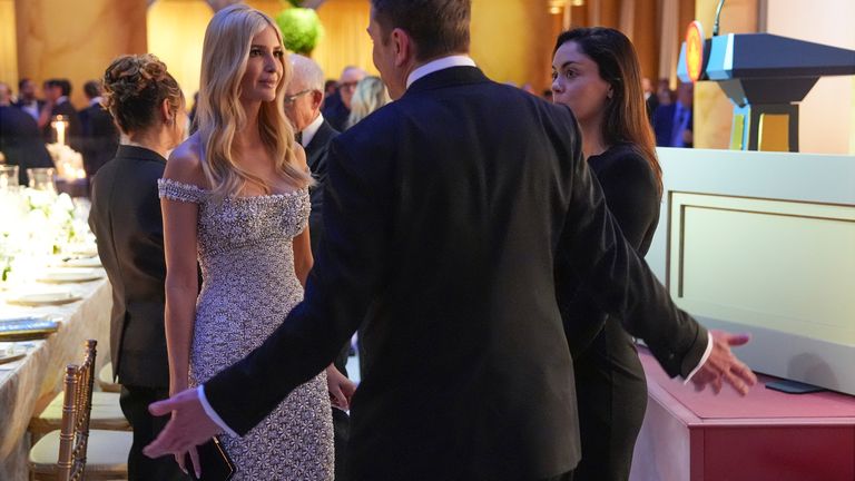 Elon Musk talks to Ivanka Trump and Shivon Zillis before Donald Trump speaks at the candle-lit dinner held at the Building Museum. Pic: AP